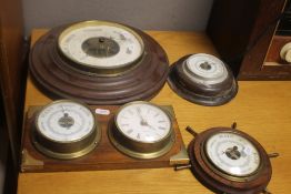 FOUR CIRCULAR BAROMETERS
