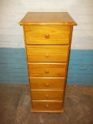A MODERN SOLID PINE SIX DRAWER NARROW CHEST