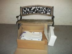 A CAST GARDEN BENCH AND A BATH RISER SEAT A/F