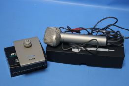 A BOXED SONY MICROPHONE AND A BOXED MICROPHONE STAND