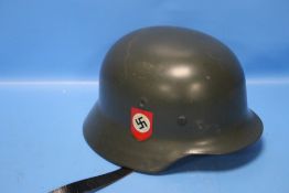 A REPRODUCTION GERMAN TYPE HELMET