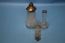 A HALLMARKED SILVER AND CUT GLASS, SUGAR SIFTER, SCENT BOTTLE AND BUD VASE