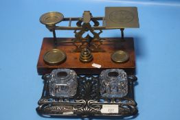 A SET OF POSTAL SCALES TOGETHER WITH A CAST INKWELL SET