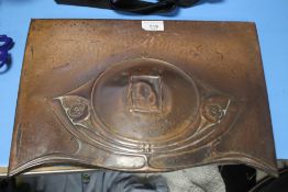 AN ART NOUVEAU CAST COPPER FIRE HOOD