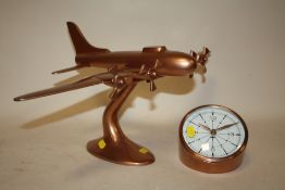 A MODERN DECORATIVE COPPER EFFECT MODEL OF AN AEROPLANE - WIDTH 56CM, HEIGHT 28CM - TOGETHER WITH