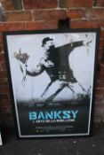A LARGE FRAMED AND GLAZED BANKSY L'ARTE DELLA RIBELLIONE PRINT OVERALL SIZE INCLUDING FRAME -