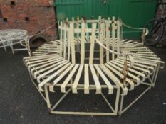A VINTAGE SLATTED SECTIONAL METAL TREE SEAT - APPROX EXTERNAL Dia. 178 cm, INTERNAL Dia. 78 cm