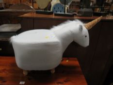 A MODERN FUNKY UNICORN STOOL
