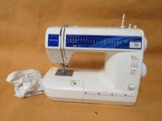 A MODERN TOYOTA ELECTRIC SEWING MACHINE