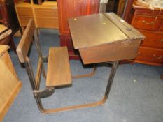 A VINTAGE CHILDS SCHOOL DESK WITH INTEGRATED SEAT