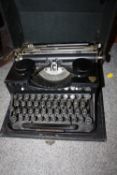 A VINTAGE CASED THRALE & BEAUMONT PORTABLE TYPEWRITER