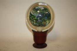 AN UNUSUAL ORIENTAL GLASS SPHERICAL ORNAMENT WITH HAND PAINTED DETAIL TO THE INTERIOR DEPICTING