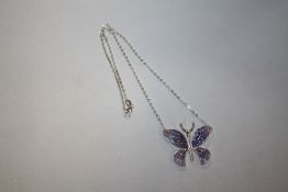 A STERLING SILVER BUTTERFLY NECKLACE - APPROX WEIGHT 7.7G