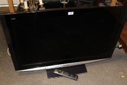 A PANASONIC VIERA 37 INCH FLAT SCREEN TV WITH REMOTE