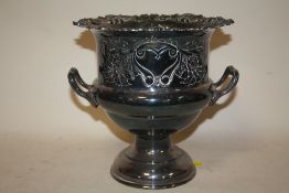 A SILVER PLATED TWIN HANDLED CHAMPAGNE BUCKET - HEIGHT 24CM