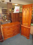 A MODERN BOW FRONTED CHERRYWOOD EIGHT DRAWER CHEST H-88 W-130 CM TOGETHER WITH A CORNER CABINET (2)