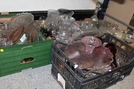 FOUR BOXES OF ASSORTED GLASSWARE TO INCLUDE VINTAGE GLASS BOTTLES, FLUTED VASE, DRINKING GLASSES