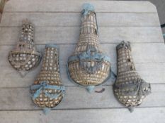 A SET OF FOUR EMPIRE STYLE CRYSTAL AND GILT METAL WALL LIGHTS A/F