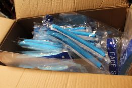 FOUR BOXES OF NEW FACE SHIELDS