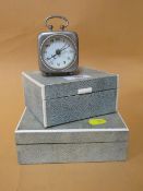 TWO SHAGREEN TYPE CIGARETTE BOXES TOGETHER WITH A VINTAGE TRAVELLING ALARM CLOCK