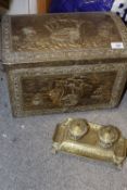 A BRASS TWIN INKWELL DESK STAND TOGETHER WITH A BRASS COVERED COAL BOX