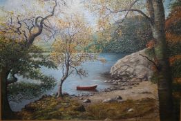 A GILT FRAMED OIL ON BOARD OF A LAKELAND SIGNED I.DOWE