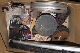 A COLLECTION OF FILM REEL EQUIPMENT TO INCLUDE A BELL & HOWELL PROJECTOR, FILM REELS ETC