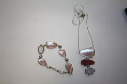 A STERLING SILVER NECKLACE AND BRACELET SET, APPROX WEIGHT - 31.4G