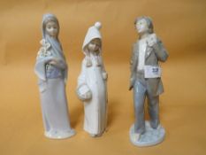TWO FEMALE LLADRO FIGURES OF A GIRL WITH FLOWERS AND A GIRL WITH BASKET TOGETHER WITH A MALE NAO