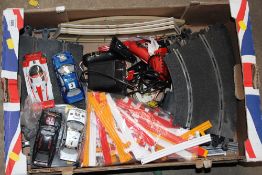 A TRAY OF SCALEXTRIC PARTS