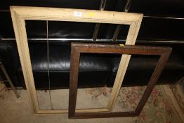 TWO VINTAGE PICTURE FRAMES TO INCLUDE AN OAK EXAMPLE LARGEST REBATE SIZE - 76CM X 55CM SMALLER -