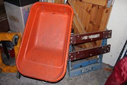 A WHEELBARROW PLUS A WORKBENCH