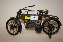 A MODERN METAL MODEL OF A VINTAGE MOTORBIKE