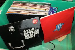 A QUANTITY OF SINGLE RECORDS TO INCLUDE KANYE WEST, EMINEM, DR DRE ETC.