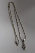 A STERLING SILVER PENDANT ON CHAIN - APPROX WEIGHT 6G