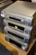 A TECHNICS SL-EH770 STACKING STEREO SYSTEM WITH SPEAKERS