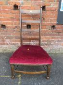 A SHAKER STYLE LADDERBACK CHAIR