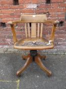 A VINTAGE OAK OFFICE SWIVEL ARMCHAIR S/D
