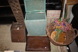 A LLOYD LOOM LUSTY LINEN BASKET, TOGETHER WITH A LARGE TWIN HANDLED LOG BASKET, MAHOGANY PURDONIUM