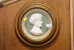 A GILT FRAMED AND GLAZED CAMEO PLAQUE - DIA 33 CM