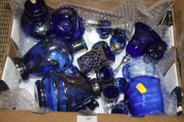 A COLLECTION OF BLUE GLASS TO INCLUDE SHOT GLASSES, VASES ETC