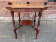 AN EDWARDIAN MAHOGANY OCCASIONAL TABLE