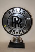 A MODERN ALUMINIUM ROLLS ROYCE LOGO ORNAMENT ON PLINTH - HEIGHT 50CM