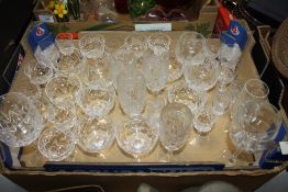 A TRAY OF CUT AND PRESSED GLASSWARE