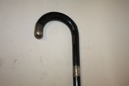 A HALLMARKED SILVER BANDED EBONISED WALKING STICK A/F