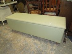 A MODERN UPHOLSTERED OTTOMAN W-150 CM