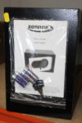 AN ELECTRIC ZENNOX SAFE WITH KEY