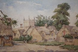 A FRAMED AND GLAZED WATERCOLOUR OF A CHURCH SIGNED E SNOWDEN - 35 CM BY 23.5 CM