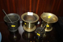 A PAIR OF TRENCH ART VASES, TOGETHER WITH TWO BRONZE EFFECT PESTLE AND MORTARS