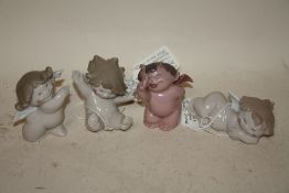 THREE SMALL NAO FIGURES OF CHERUBS, TOGETHER WITH A NAO DEMON FIGURE A/F (4)